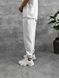Мужские oversize спортивные брюки в белом цвете нф1940 фото 5