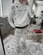 Чоловічий oversize спортивний костюм з принтом у білому кольорі p20fhs5 фото 1