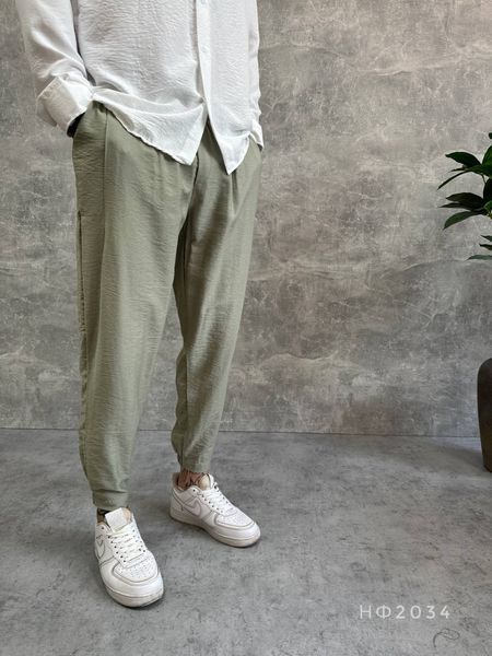 Мужские льняные брюки джогеры в зеленом цвете нф2034 фото
